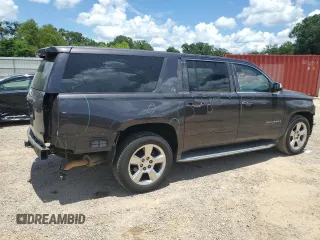 2015 Chevrolet Suburban LTZ with VIN 1GNSCKKC7FR552173, listed as a Copart auction lot 63483995 with 250,564 mi miles and Salvage title. Bid and sale history available at DreamBid. Image 3.