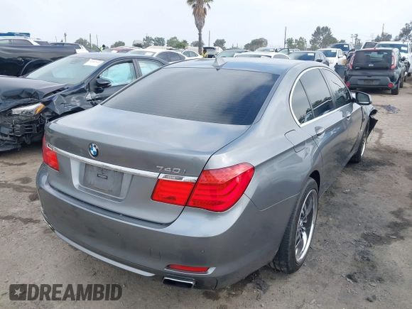 2012 BMW 7 Series 740i with VIN WBAKA4C52CC613676, listed as a IAAI auction lot 42509312 with 113,971 mi miles and . Bid and sale history available at DreamBid. Image 4.