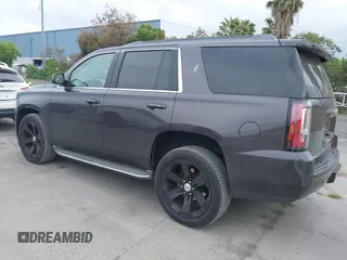 2015 GMC Yukon SLT with VIN 1GKS1BKC6FR245564, listed as a IAAI auction lot 42139295 with 149,088 mi miles. Bid and sale history available at carsss.com. Image 3.