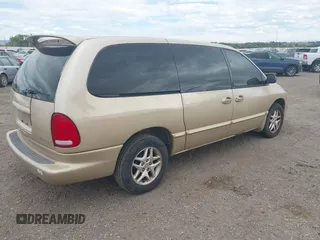 2000 Dodge Caravan SE z VIN 1B4GP44G6YB798882, wystawiony jako IAAI lot #42260881 z przebiegiem 195 020 mil mil oraz . Historia ofert i sprzedaży dostępna na DreamBid. Obrazek 4.