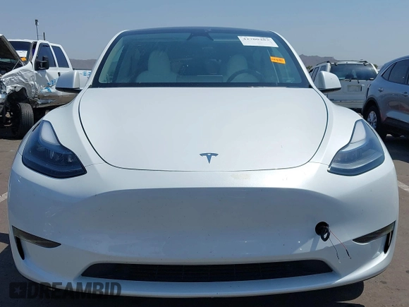 2024 Tesla Model Y with VIN 7SAYGDED8RF201955, listed as a IAAI auction lot 42700483 with 11,898 mi miles and . Bid and sale history available at DreamBid. Image 13.