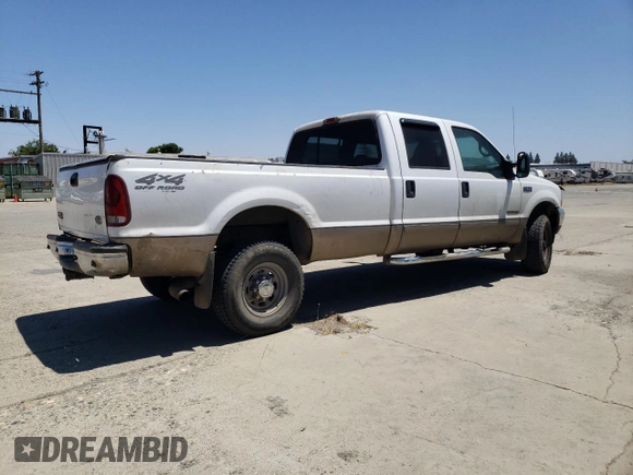 2002 Ford F-350 XL with VIN 1FTSW31F52EC95663, listed as a Copart auction lot 61106125 with Not provided miles and Salvage title. Bid and sale history available at DreamBid. Image 3.