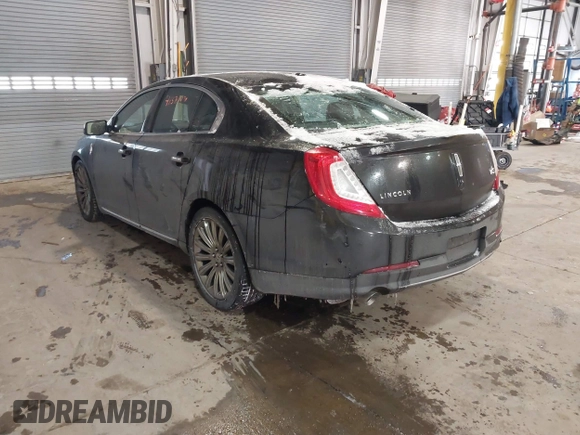 2014 Lincoln MKS with VIN 1LNHL9DK8EG609955, listed as a IAAI auction lot 41580770 with 109,864 mi miles. Bid and sale history available at carsss.com. Image 3.