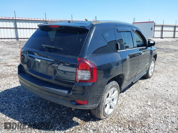 2014 Jeep Compass Sport with VIN 1C4NJCBA0ED510942, listed as a IAAI auction lot 41952596 with 196,030 mi miles and . Bid and sale history available at DreamBid. Image 4.