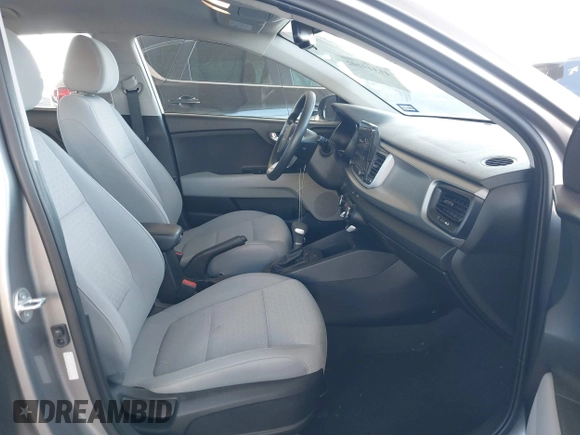 2023 Kia Rio S z VIN 3KPA24AD1PE579816, wystawiony jako IAAI lot #41349202 z przebiegiem 5784 mil mil oraz . Historia ofert i sprzedaży dostępna na DreamBid. Obrazek 5.