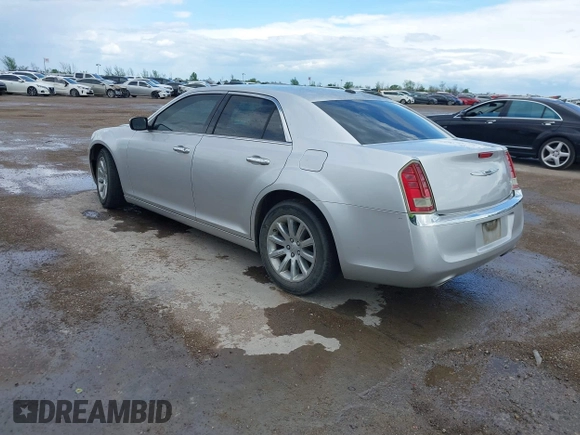 2012 Chrysler 300 Limited with VIN 2C3CCACGXCH212881, listed as a IAAI auction lot 41882643 with 160,645 mi miles. Bid and sale history available at carsss.com. Image 3.