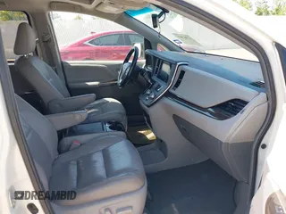 2015 Toyota Sienna XLE with VIN 5TDYK3DCXFS663083, listed as a IAAI auction lot 41967621 with 177,472 mi miles and . Bid and sale history available at DreamBid. Image 5.