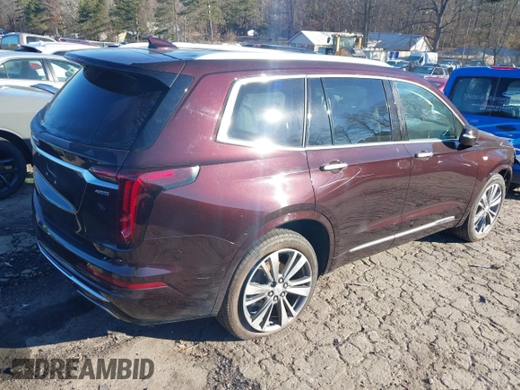 2021 Cadillac XT6 Premium Luxury with VIN 1GYKPDRS7MZ133561, listed as a IAAI auction lot 41112365 with 73,956 mi miles. Bid and sale history available at carsss.com. Image 4.