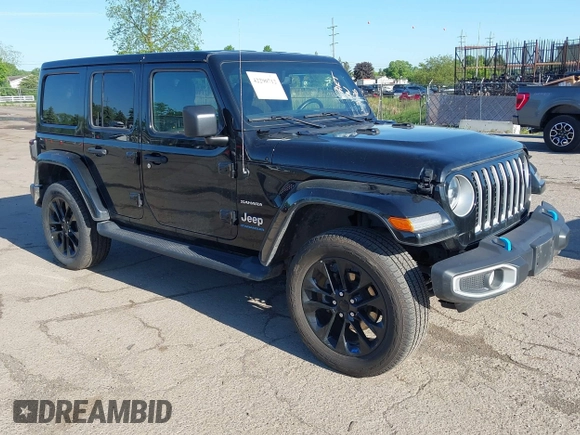 2023 Jeep Wrangler Sahara z VIN 1C4JJXP60PW627051, wystawiony jako IAAI lot #42290712 z przebiegiem 28 269 mil mil oraz . Historia ofert i sprzedaży dostępna na DreamBid. Obrazek 1.