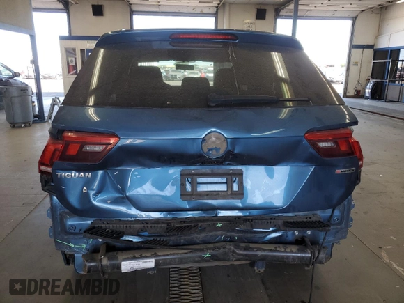 2019 Volkswagen Tiguan S with VIN 3VV0B7AX2KM197883, listed as a Copart auction lot 64978515 with 54,961 mi miles and Salvage title. Bid and sale history available at DreamBid. Image 6.