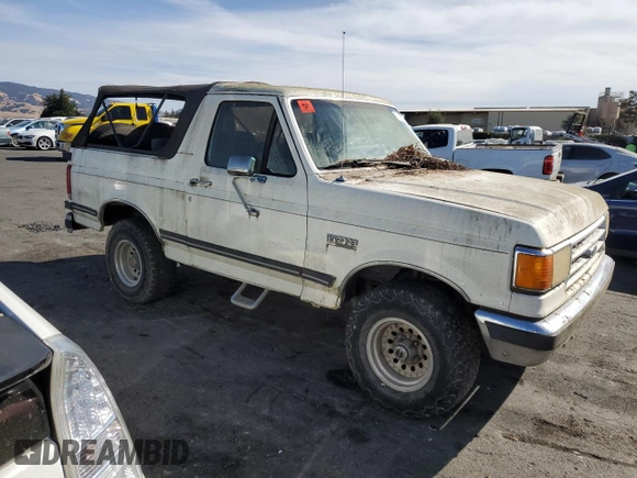 1989 Ford Bronco Custom с VIN 1FMEU15H0KLB48449, выставлен на аукционе Copart как лот 78316474 с пробегом 82 957 миль миль и Чистый • Clean title. История ставок и продаж доступна на DreamBid. Изображение 4.