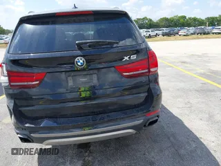 2016 BMW X5 xDrive50i with VIN 5UXKR6C51G0J81658, listed as a IAAI auction lot 41801382 with 34,572 mi miles. Bid and sale history available at carsss.com. Image 17.