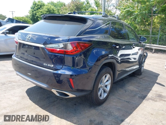 2016 Lexus RX 350 with VIN JTJBZMCA2G2001429, listed as a IAAI auction lot 42202436 with Not provided miles and . Bid and sale history available at DreamBid. Image 4.