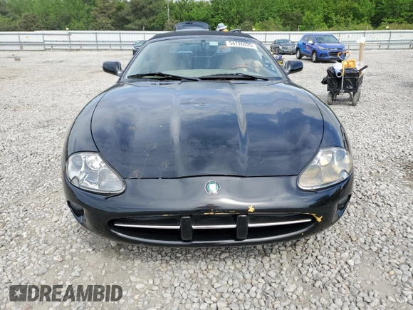 1999 Jaguar XK z VIN SAJGX2044XC031383, wystawiony jako Copart lot #54726925 z przebiegiem 107 696 mil mil oraz Szkody całkowita. Historia ofert i sprzedaży dostępna na DreamBid. Obrazek 5.