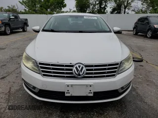 2013 Volkswagen CC Sport z VIN WVWBN7AN3DE515466, wystawiony jako Copart lot #56829715 z przebiegiem 171 667 mil mil oraz Czysty tytuł • Clean title. Historia ofert i sprzedaży dostępna na DreamBid. Obrazek 5.