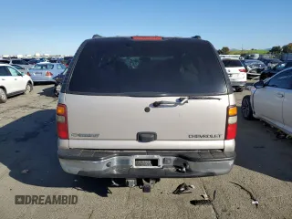 2004 Chevrolet Tahoe LS z VIN 1GNEC13V94R144116, wystawiony jako Copart lot #44201645 z przebiegiem Nie podano mil oraz Czysty tytuł • Clean title. Historia ofert i sprzedaży dostępna na DreamBid. Obrazek 6.