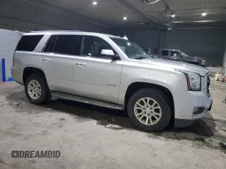 2019 GMC Yukon SLT with VIN 1GKS2BKCXKR349370, listed as a Copart auction lot 46880055 with 115,266 mi miles and Clean Title. Bid and sale history available at carsss.com. Image 4.
