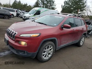 2014 Jeep Cherokee Altitude with VIN 1C4PJMCSXEW124863, listed as a Copart auction lot 82432534 with 194,559 mi miles and Salvage Title. Bid and sale history available at carsss.com. Image 1.