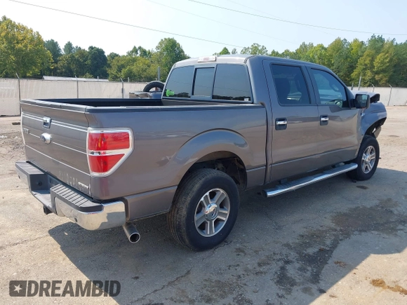 2014 Ford F-150 XL with VIN 1FTFW1CF2EKF75517, listed as a IAAI auction lot 40534480 with 121,035 mi miles. Bid and sale history available at carsss.com. Image 4.