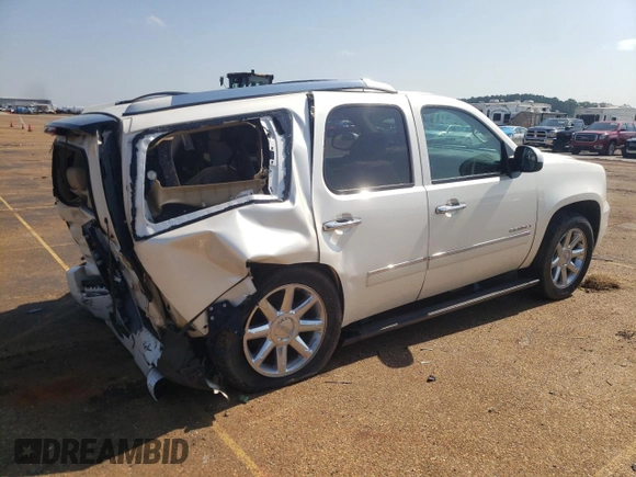 2013 GMC Yukon Denali with VIN 1GKS2EEF9DR311929, listed as a Copart auction lot 63810874 with 122,356 mi miles and Salvage Title. Bid and sale history available at carsss.com. Image 3.