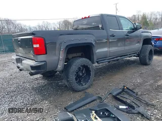 2015 GMC Sierra 1500 SLE z VIN 1GTV2UEC1FZ321141, wystawiony jako IAAI lot #41814049 z przebiegiem 91 173 mil mil oraz . Historia ofert i sprzedaży dostępna na DreamBid. Obrazek 4.