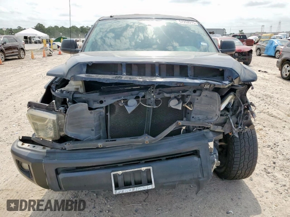 2014 Toyota Tundra SR с VIN 5TFRM5F12EX071952, выставлен на аукционе Copart как лот 57252215 с пробегом 143 706 миль миль и Списание • Salvage title. История ставок и продаж доступна на DreamBid. Изображение 5.