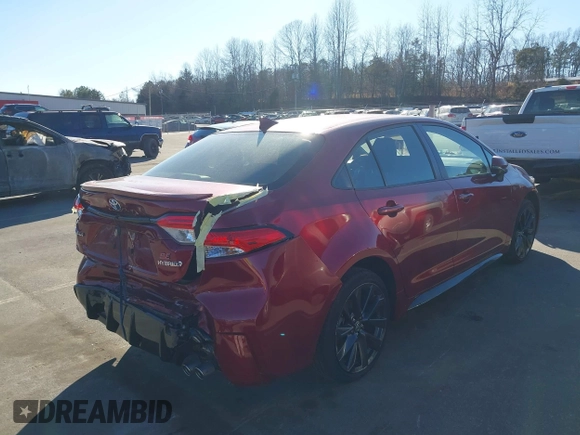 2023 Toyota Corolla Hybrid LE with VIN JTDBCMFE2PJ008826, listed as a IAAI auction lot 41428742 with 21,256 mi miles. Bid and sale history available at carsss.com. Image 4.
