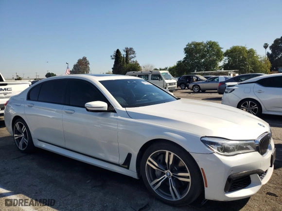 2019 BMW 7 Series 750i with VIN WBA7F0C5XKGM25771, listed as a Copart auction lot 47239195 with 73,691 mi miles and Salvage Title. Bid and sale history available at carsss.com. Image 4.