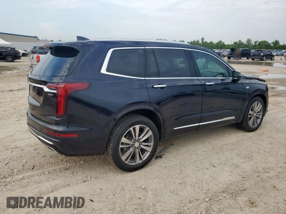 2022 Cadillac XT6 Premium Luxury with VIN 1GYKPCRS1NZ152828, listed as a Copart auction lot 64646525 with 18,913 mi miles and Salvage title. Bid and sale history available at DreamBid. Image 3.