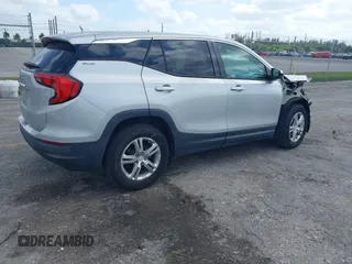 2018 GMC Terrain SLE with VIN 3GKALMEV7JL190394, listed as a IAAI auction lot 42123931 with 49,588 mi miles and . Bid and sale history available at DreamBid. Image 4.