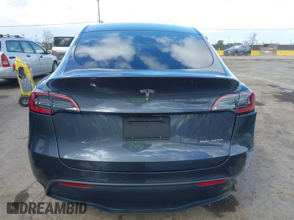 2022 Tesla Model Y Long Range with VIN 7SAYGAEE6NF341827, listed as a IAAI auction lot 41946388 with Not Provided miles and . Bid and sale history available at DreamBid. Image 15.