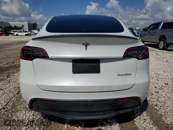2023 Tesla Model Y Performance with VIN 7SAYGDEF0PF832570, listed as a Copart auction lot 51141415 with Not Provided miles and Non Repairable. Bid and sale history available at DreamBid. Image 6.