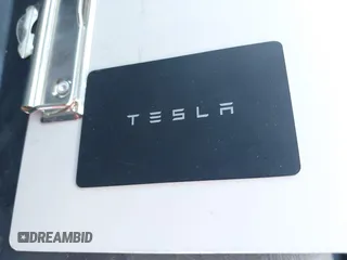 2023 Tesla Model Y Long Range with VIN 7SAYGAEE7PF971620, listed as a IAAI auction lot 41654688 with Not Provided miles and . Bid and sale history available at DreamBid. Image 11.