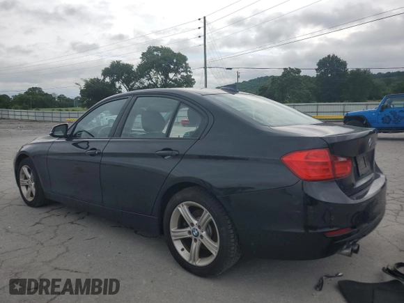 2015 BMW 3 Series 328i with VIN WBA3C1C58FP851848, listed as a Copart auction lot 61445445 with 74,814 mi miles and Salvage title. Bid and sale history available at DreamBid. Image 2.