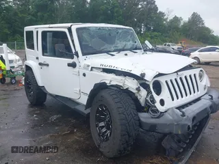 2016 Jeep Wrangler Unlimited Rubicon Hard Rock with VIN 1C4BJWFG3GL228449, listed as a IAAI auction lot 42158318 with Not provided miles and . Bid and sale history available at DreamBid. Image 1.
