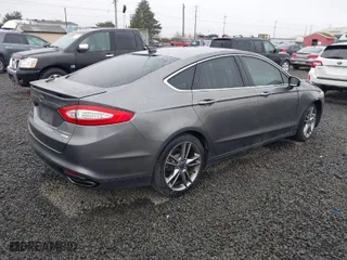 2014 Ford Fusion Titanium with VIN 3FA6P0K90ER317209, listed as a IAAI auction lot 41765326 with 89,942 mi miles. Bid and sale history available at carsss.com. Image 4.
