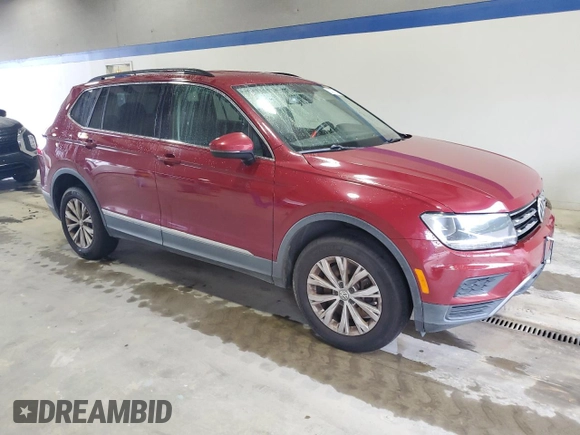 2018 Volkswagen Tiguan SEL with VIN 3VV3B7AX0JM124135, listed as a Copart auction lot 60721155 with 98,247 mi miles and Salvage title. Bid and sale history available at DreamBid. Image 4.