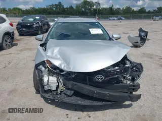 2014 Toyota Corolla L with VIN 5YFBURHE9EP160912, listed as a IAAI auction lot 42159372 with 125,863 mi miles and . Bid and sale history available at DreamBid. Image 13.
