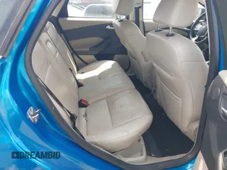 2013 Ford Focus Electric z VIN 1FADP3R44DL222541, wystawiony jako IAAI lot #42157870 z przebiegiem 59 880 mil mil oraz . Historia ofert i sprzedaży dostępna na DreamBid. Obrazek 8.