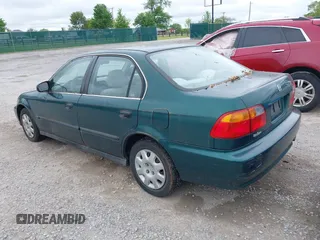 1999 Honda Civic LX z VIN 1HGEJ6678XL047636, wystawiony jako IAAI lot #42230561 z przebiegiem 127 439 mil mil oraz . Historia ofert i sprzedaży dostępna na DreamBid. Obrazek 3.