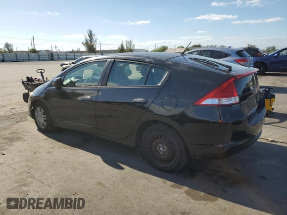 2010 Honda Insight LX with VIN JHMZE2H50AS009869, listed as a Copart auction lot 53031515 with 194,860 mi miles and Salvage Title. Bid and sale history available at DreamBid. Image 2.