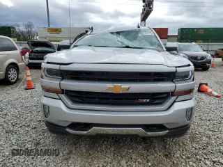 2018 Chevrolet Silverado 1500 LT with VIN 1GCVKREH4JZ118570, listed as a Copart auction lot 53143175 with 105,685 mi miles and Salvage Title. Bid and sale history available at DreamBid. Image 5.