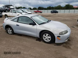 1999 Mitsubishi Eclipse RS with VIN 4A3AK34Y4XE055125, listed as a Copart auction lot 73249544 with 100,125 mi miles and Clean Title. Bid and sale history available at carsss.com. Image 4.