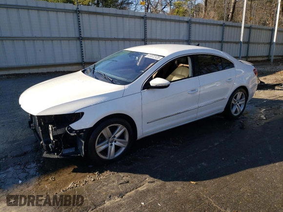 2014 Volkswagen CC Sport with VIN WVWBN7AN4EE525005, listed as a Copart auction lot 41372125 with 104,646 mi miles and Salvage Title. Bid and sale history available at carsss.com. Image 1.