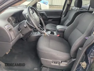 2004 Jeep Grand Cherokee Laredo with VIN 1J4GW48S84C200259, listed as a Copart auction lot 51002325 with 158,193 mi miles and Salvage Title. Bid and sale history available at carsss.com. Image 7.
