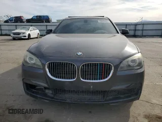 2012 BMW 7 Series 750i with VIN WBAKA8C58CDS99694, listed as a Copart auction lot 46828435 with 131,458 mi miles and Salvage title. Bid and sale history available at DreamBid. Image 5.