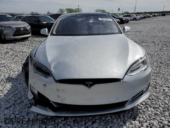 2016 Tesla Model S 90D with VIN 5YJSA1E25GF142104, listed as a Copart auction lot 50874815 with 84,917 mi miles and Salvage Title. Bid and sale history available at DreamBid. Image 5.