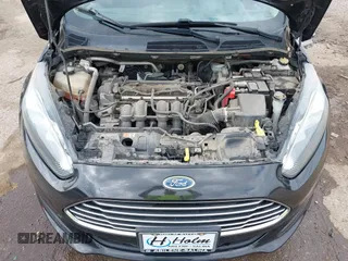 2015 Ford Fiesta SE with VIN 3FADP4BJXFM135864, listed as a IAAI auction lot 39462016 with 113,486 mi miles and . Bid and sale history available at DreamBid. Image 10.