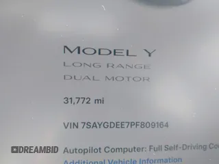 2023 Tesla Model Y Long Range with VIN 7SAYGDEE7PF809164, listed as a IAAI auction lot 41828974 with 31,772 mi miles. Bid and sale history available at carsss.com. Image 15.