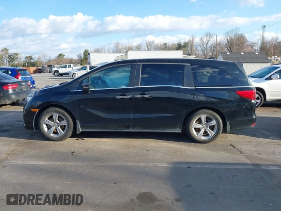2019 Honda Odyssey EX-L with VIN 5FNRL6H74KB061567, listed as a IAAI auction lot 41810919 with 129,146 mi miles. Bid and sale history available at carsss.com. Image 14.